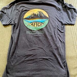 black aftico tee featuring design on the back